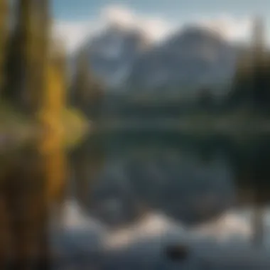 Serenity of the Reflective Lake Against Mountain Peaks Crystal-clear lake reflecting the mountain peaks