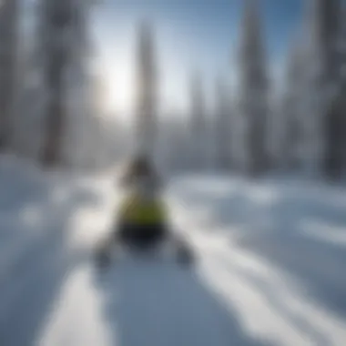Experience Thrilling Trails in Brian Head A snowmobiler gliding through pristine snowy trails