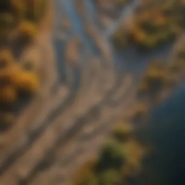 Aerial view of a riverbank showcasing erosion effects